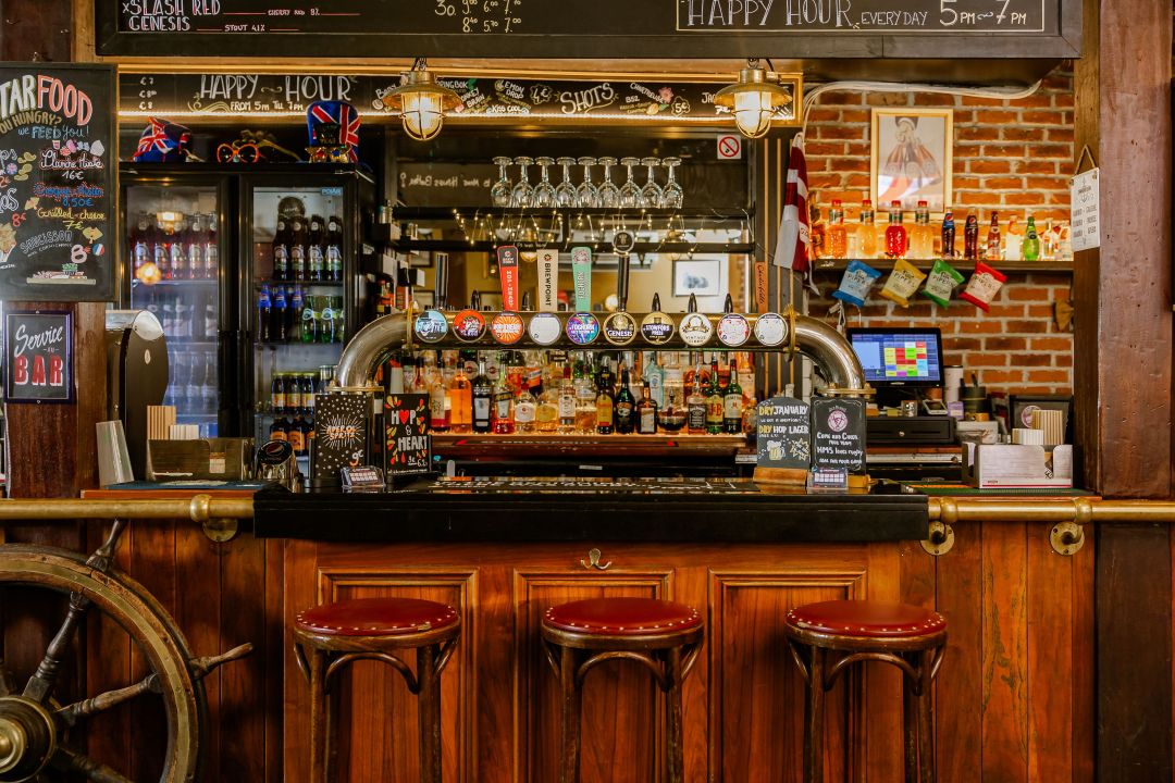 The HMS Victory pub's bar with a variety of beers on tap